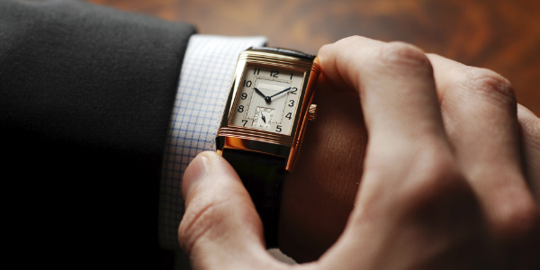 Man Checks Watch Stress in Singapore